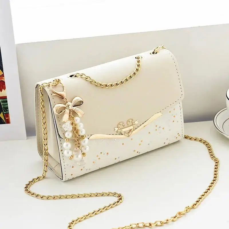 Women's Sequin Bow Shoulder Bag – PU Leather Crossbody Handbag with Tassel Pendant in 4 Colours